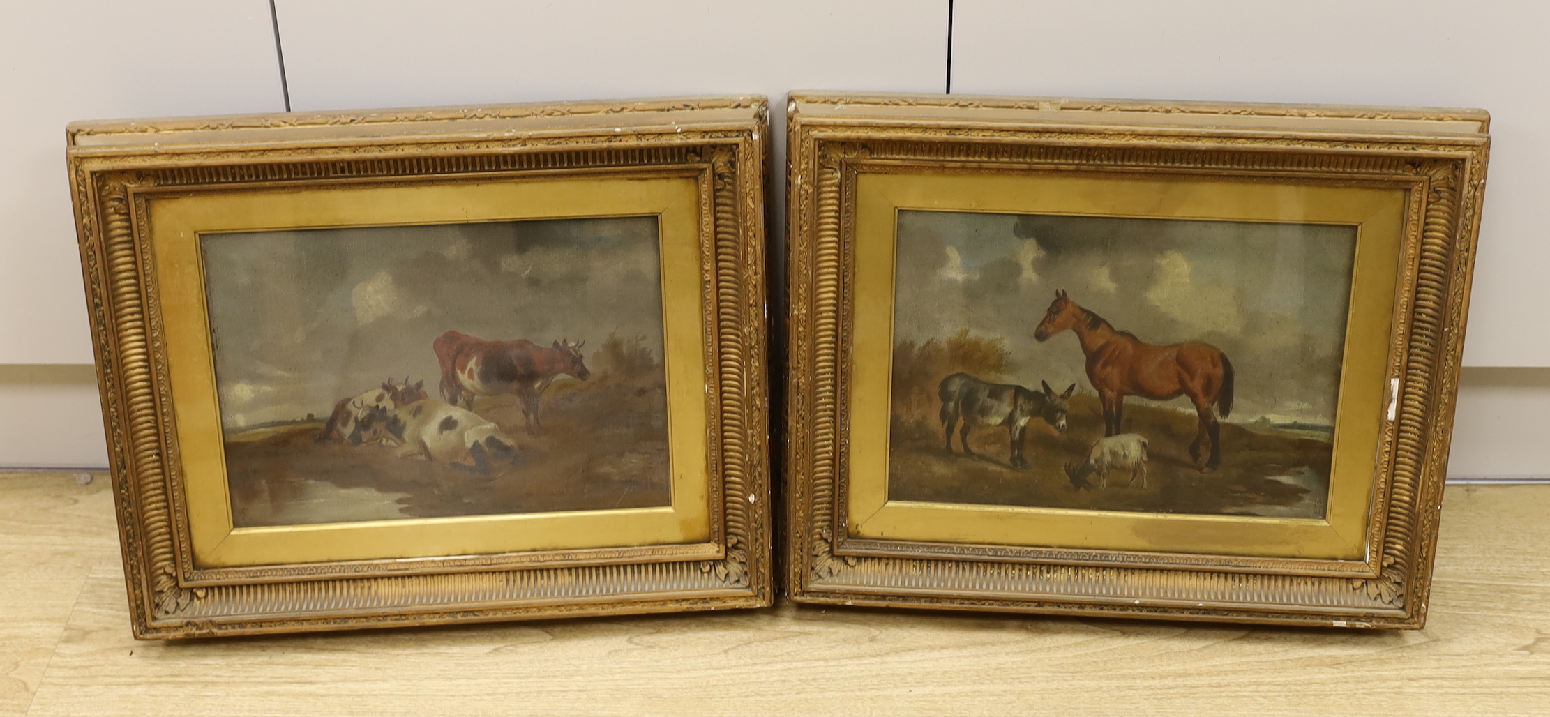 After George Morland, 19th century pastoral scenes, one with a trio of cattle beside a lake, the other with a hors, donkey and goat, pair of oils on canvas, each monogrammed, framed, 24 x 34cm